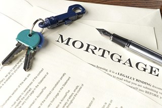 mortgage documents with keys