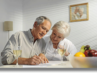 retired couple looking at finances