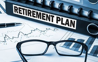 retirement plan folder with glasses