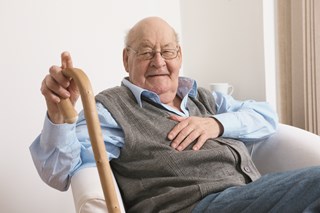 elderly man in chair