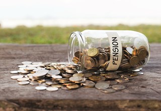 Pension jar tipped over spilling coins