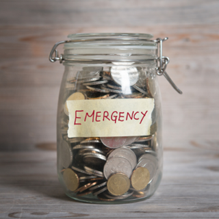 emergency fund jar full of coins