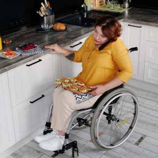 Person in a wheelchair | Finances if you're living with a disability